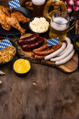 Wall Mural - Oktoberfest dishes with beer, pretzel and sausage