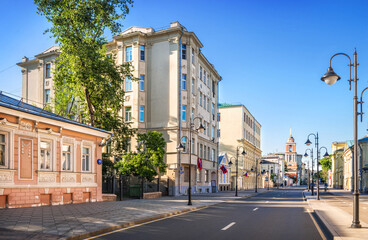 Wall Mural - Ancient buildings and the bell tower of the Trinity Church on Pyatnitskaya Street in Moscow