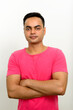 © Ranta Images - Portrait of young handsome Indian man against white background