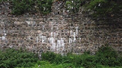 Sticker - Ancient brick wall. overgrown ruins. view moves from left to right