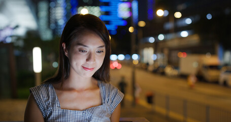 Sticker - Woman use of tablet computer at street