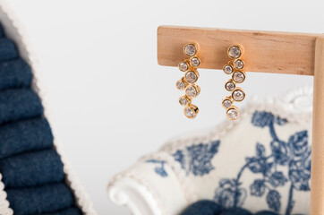 Close up of diamond earrings. space for your text.