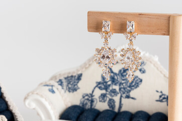 Close up of diamond earrings. space for your text.