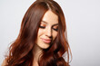 © mikhail_b_azarov - beauty portrait of a young red-haired woman on white background.