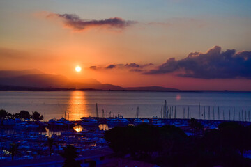 Landscape of beautiful Marina Baie des Anges on background of wonderful sunset. Villeneuve-Loubet. France.