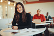 © Jacob Lund - Student in university classroom