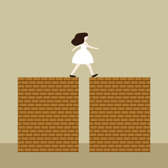 Young woman steps from one brick wall to another brick wall