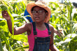 © Creative Flame - Young girl inspecting corn on family farm