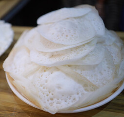 Appam, Palappam,Kallappam,vella appam,parotta,Roti or Chapati a popular traditional Kerala breakfast food.