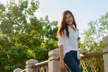 young beautiful asian woman at the park outdoors