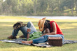 © Creative Flame - Middle aged couple having picnic in park
