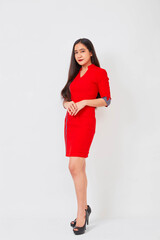 Wall Mural - Young beautiful business woman in red dress