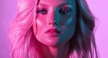 Beautiful Girl In A Neon Light, Blue And Violet Colors. Palette Of Tints In The Bright Make Up On The Face Of Appealing Woman. Cosmic And Fantastic Female Image.  Cosmetics, Makeup And Beauty.
