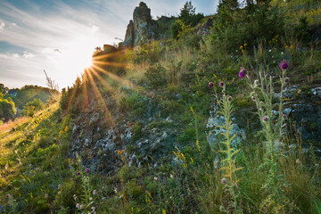 Wall Mural - Rock hillside of Franconian Switzerland, sunset on summer evening