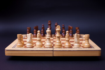 Wall Mural - A game of chess, the beginning of a chess game two sides opposite each other.