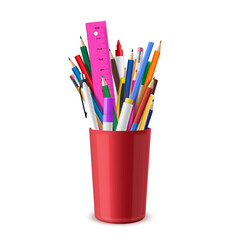 Stationery are in red plastic cup. Pens, pencils, eraser, felt-tips, markers, ruler. School or office supplies.