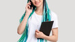 © golubovy - Millennial generation woman with blue dyed hair braids in business. Cheerful lady with creative hairstyle having business call on phone isolated on white. Modern startup. female leadership.