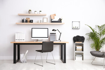 Home workplace with modern computer and desk in room. Mockup for design