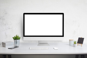 Poster - Computer display mockup on work desk. White work desk with plants, phone, box, keyboard and mouse. Web site design promotion template