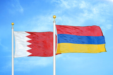 Bahrain and Armenia two flags on flagpoles and blue sky