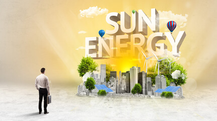 Rear view of a businessman standing in front of SUN ENERGY inscription, Environmental protection concept