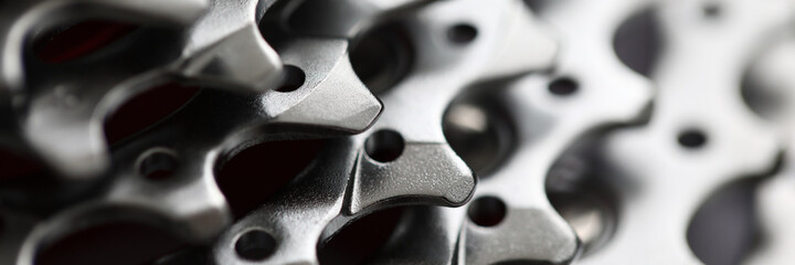 Wall Mural - Close-up of bicycle roller chain that transfers power from pedals to drive. Macro shot of metal wheel detail. Rear cassette in mountain bike. Transport component concept