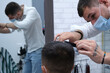 © Salva Ordaz - hairdresser cutting hair with mask