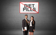© ra2 studio - business person holding a traffic sign with DIET PILLS inscription, new idea concept