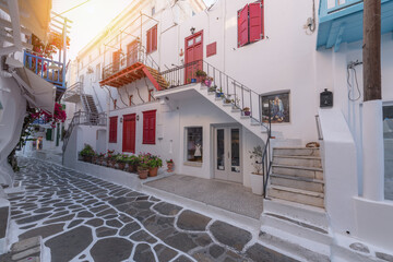 Naklejka na meble Streetview of Mykonos with whitewashed walls and doors and red windows, Greece. Travel and tourism concept.