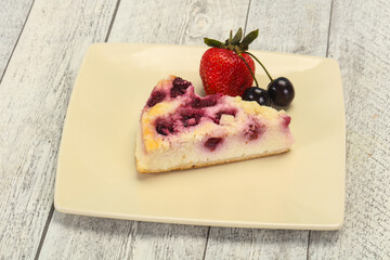 Wall Mural - Cheesecake with cherry served strawberry