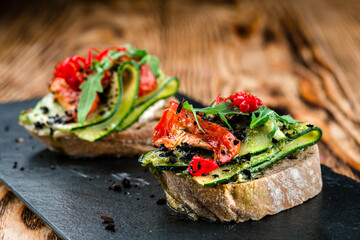 Canvas Print - bruschetta with tomato and cucumber