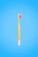 Isolated Flat Lay Style Of Pink  Toothbrush On Blue Background, Pink Bamboo Toothbrush