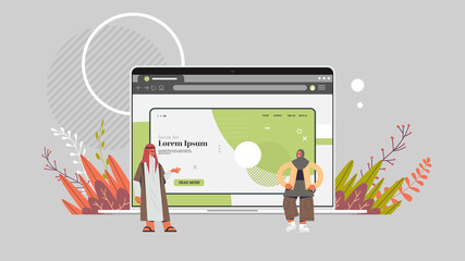 Wall Mural - arab couple creating custom design on laptop screen application development web design concept horiz