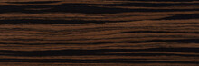 Unique Ebony Veneer Background In Dark Color. Natural Wood Texture, Pattern Of A Long Veneer Sheet, Plank.