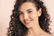 © Pixel-Shot - Beautiful young woman with foundation on her face against color background