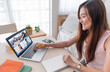 © weedezign - asian woman work from home with video conference app collaboration with colleagues.live streaming meeting.new normal lifestyle after covid-19
