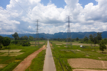 Aerial view of country road to mountain showing scenic view of nature in Laos.