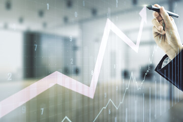 Double exposure of man hand with pen working with abstract creative financial chart and upward arrow on blurred office background, research and strategy concept