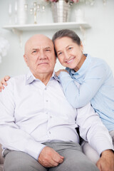 Poster - cute elderly couple in light interior.