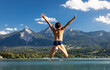 © Matthias - young woman jumping in the water