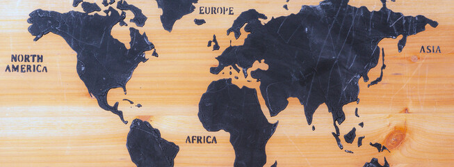 Vintage Panoramic Top view image. Detailed World physical map on wooden background.