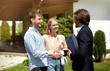 © Prostock-studio - Young married couple shaking hands with realtor, making deal about house purchase outside