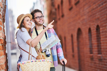 Wall Mural - Adult happy tourists sightseeing Gdansk Poland in summer