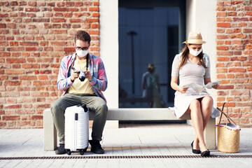 Wall Mural - Adult tourists in masks sightseeing Gdansk Poland