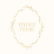 © Kirill - Hand drawn gold filigree ornate classic  wedding border. Vintage oval royal frame with swirls and scrolls.  Vector isolated golden calligraphic invitation card template.