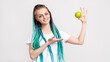 © golubovy - Detox diet. Vegan lifestyle. Cheerful hipster woman with long blue colored hair braids showing raw green apple isolated on white. Fruit vitamin. Organic nutrition. Antioxidant food.