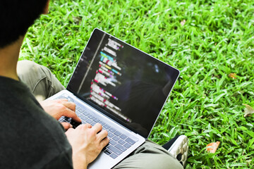 Wall Mural - selective focus developer programming and coding technology on computer laptop website design safety