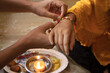 © sudarshan - Indian festival: A traditional Indian wrist band which is a symbol of love between Brother and Siste