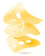 Pieces of cheese are flying in the air on a white isolated background. Levitation