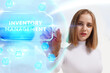 © photon_photo - Business, Technology, Internet and network concept. Young businessman working on a virtual screen of the future and sees the inscription: Inventory management